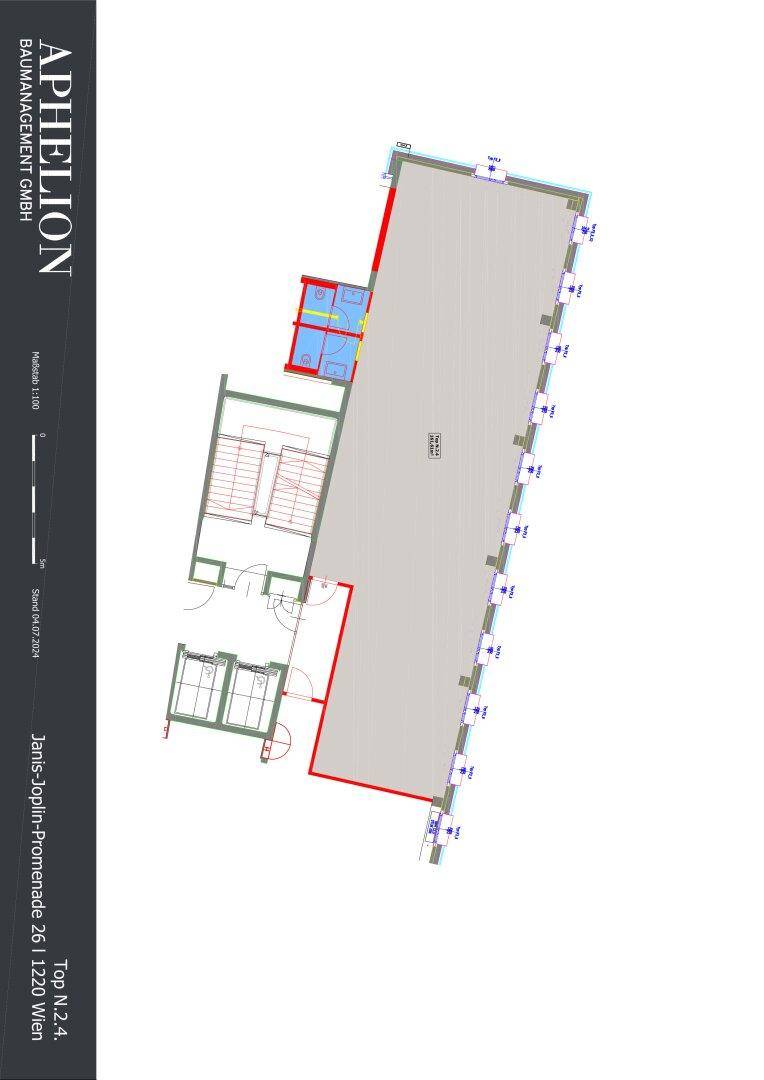 Grundrissplan einer großen Bürofläche mit Treppenhaus und Sanitärbereichen.