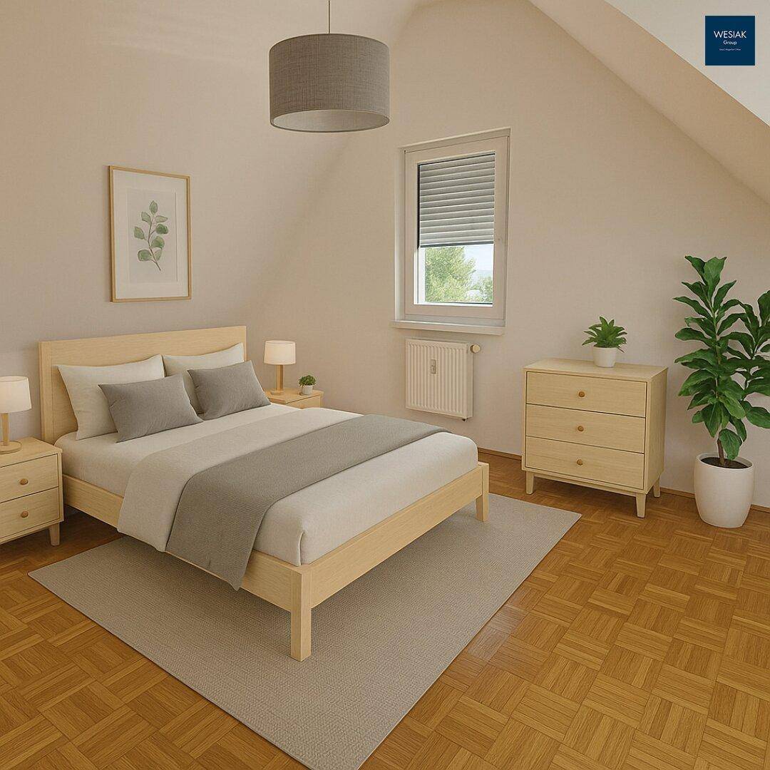Gemütliches Schlafzimmer im Dachgeschoss mit Holzbett, Nachttischen und Parkettboden.