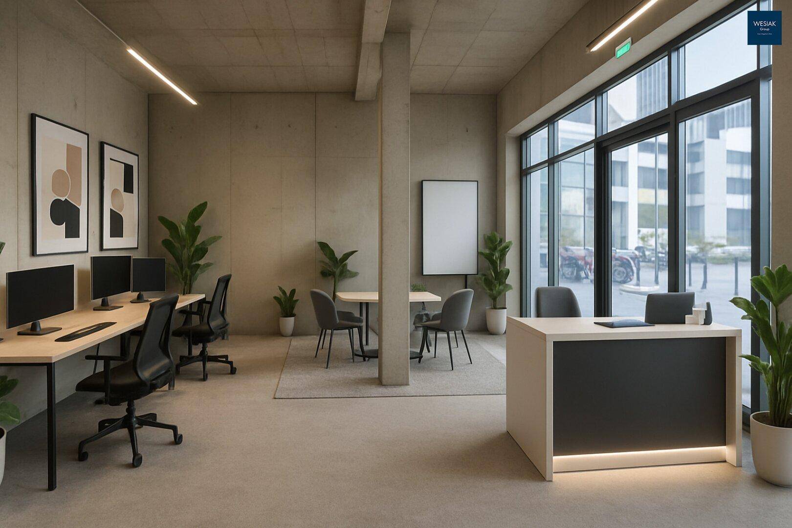 Modernes Großraumbüro mit Empfangsbereich, Arbeitsplätzen und großen Fenstern für viel Tageslicht.