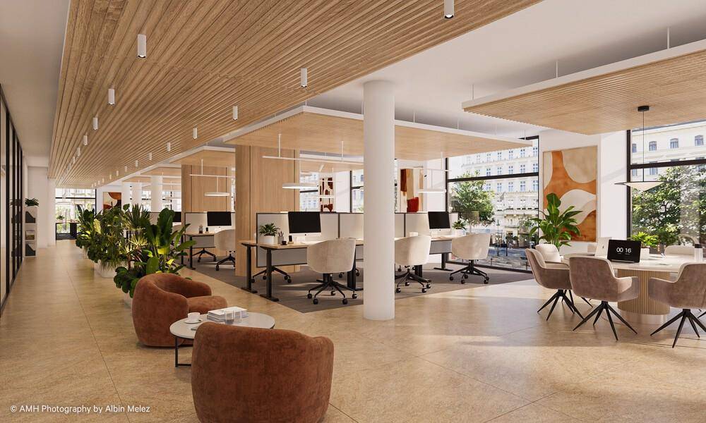 Geräumiges und helles Büro mit modernen Möbeln, Pflanzen und einem Loungebereich für entspannte Pausen.