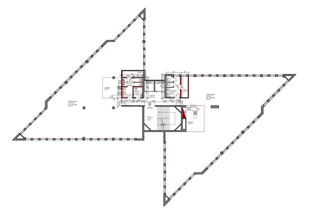 Grundriss einer oberen Etage mit zentralem Treppenhaus und Aufzug, umgeben von offenen Büroflächen.