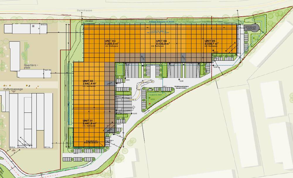 Übersichtsplan eines neuen Gewerbegebiets mit mehreren Einheiten, Parkplätzen und Grünflächen.