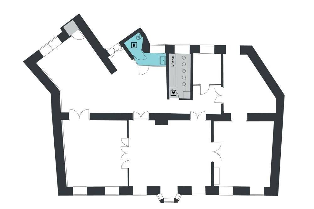 Grundriss einer Wohnung mit mehreren Räumen, Küche und Bad.