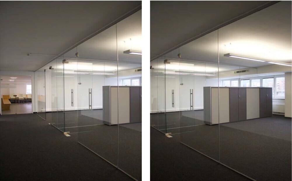 Großer Bürobereich mit Glaswänden und integrierten Schränken, ideal für offene Konzepte.