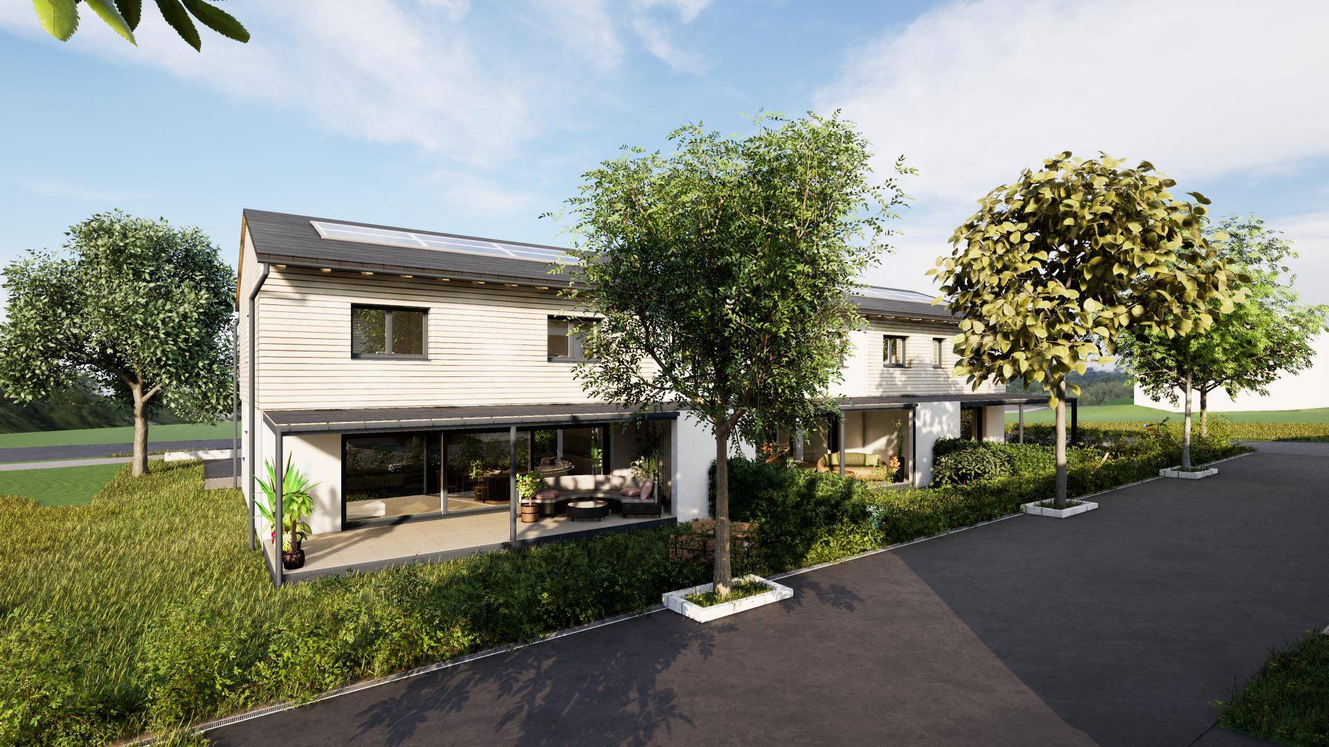 Moderne Reihenhäuser mit großen Glasfronten im Erdgeschoss und Photovoltaikanlagen auf dem Dach.