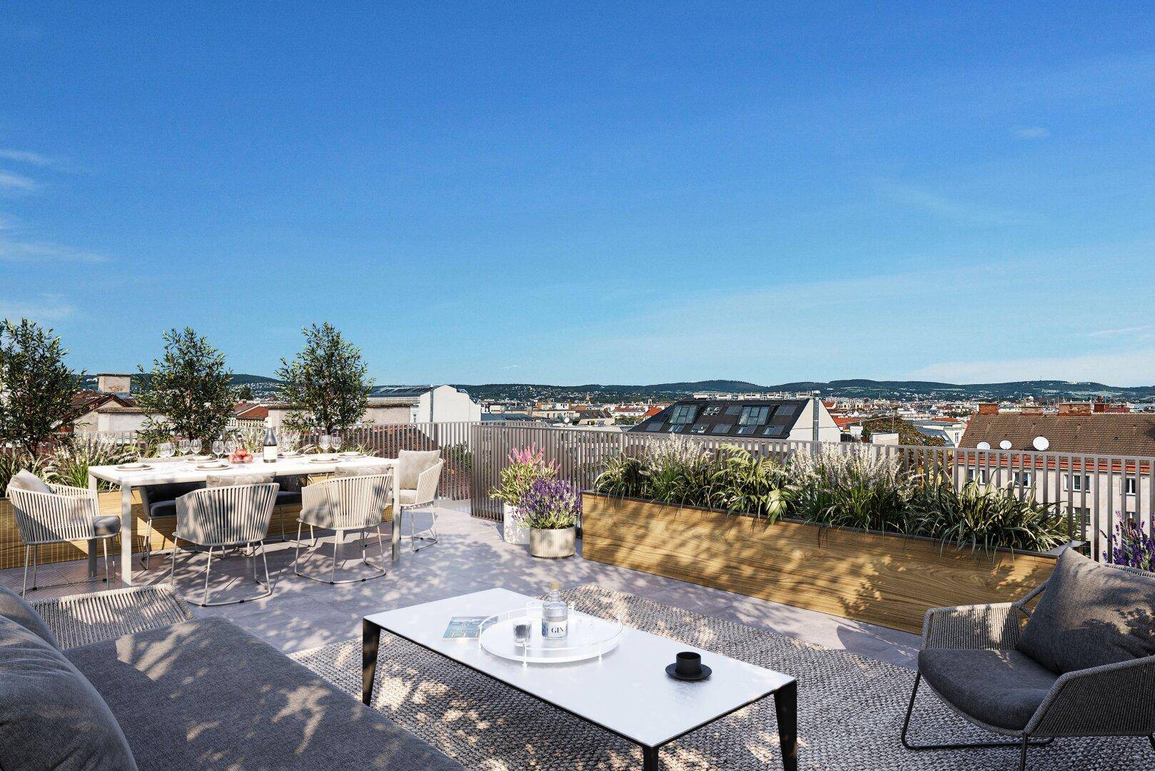 Großzügige Dachterrasse mit Ess- und Loungebereich sowie weitem Stadtblick.