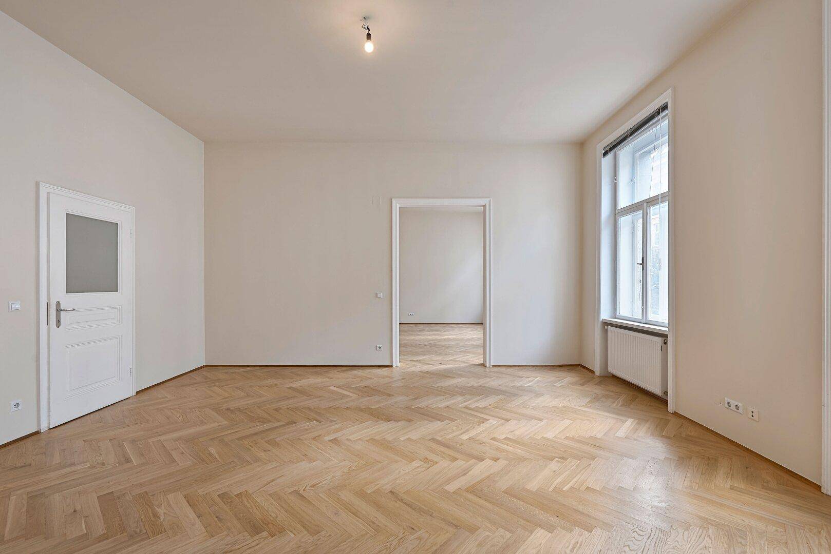 Wohnzimmer Blick ins Schlafzimmer