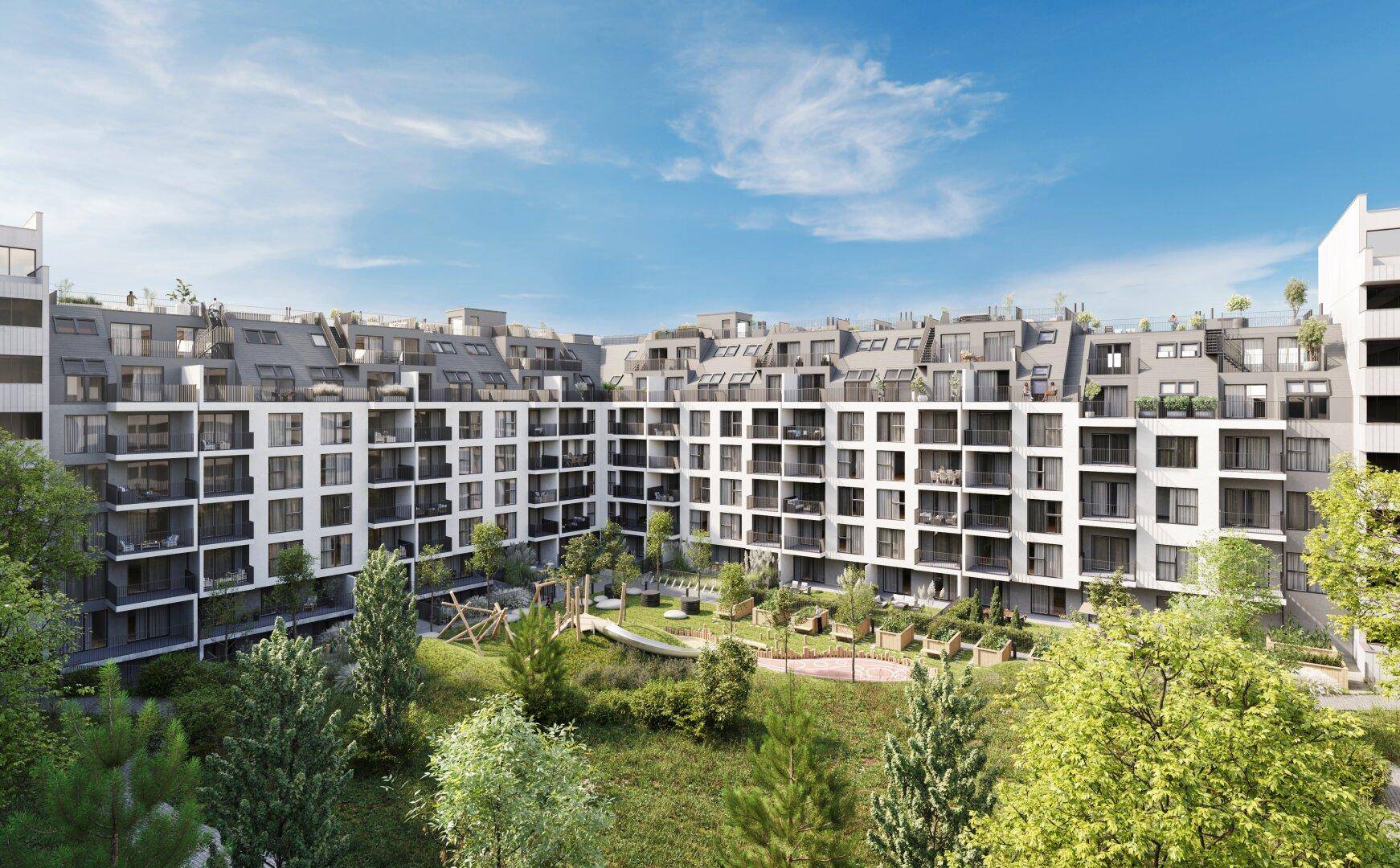 Moderne Wohnanlage mit mehreren Gebäuden, Balkonen und einem begrünten Innenhof unter blauem Himmel.