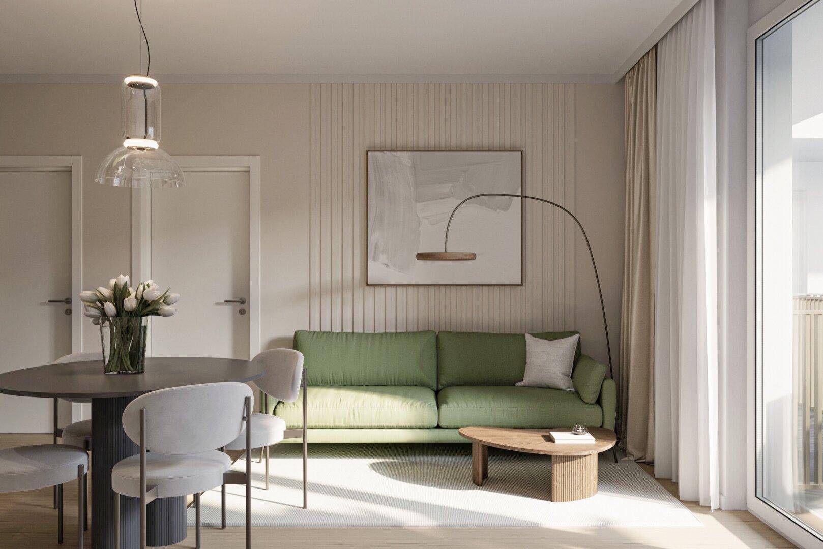 Heller Wohn- und Essbereich mit modernem Sofa, Esstisch und Zugang nach draußen.