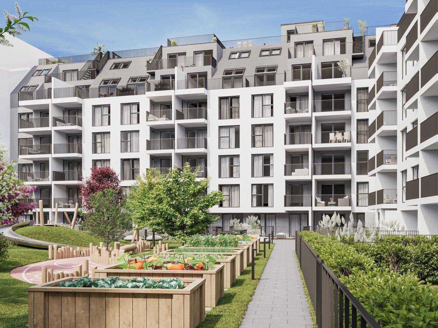 Moderner Apartmentkomplex mit vielen Balkonen und einem grünen Innenhof mit Hochbeeten und Spielplatz.