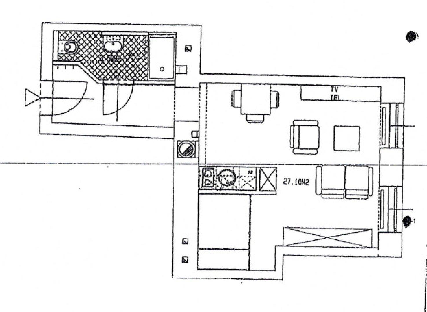 Grundrissplan einer Wohnung mit Wohnbereich, Küchenzeile und Badezimmer.