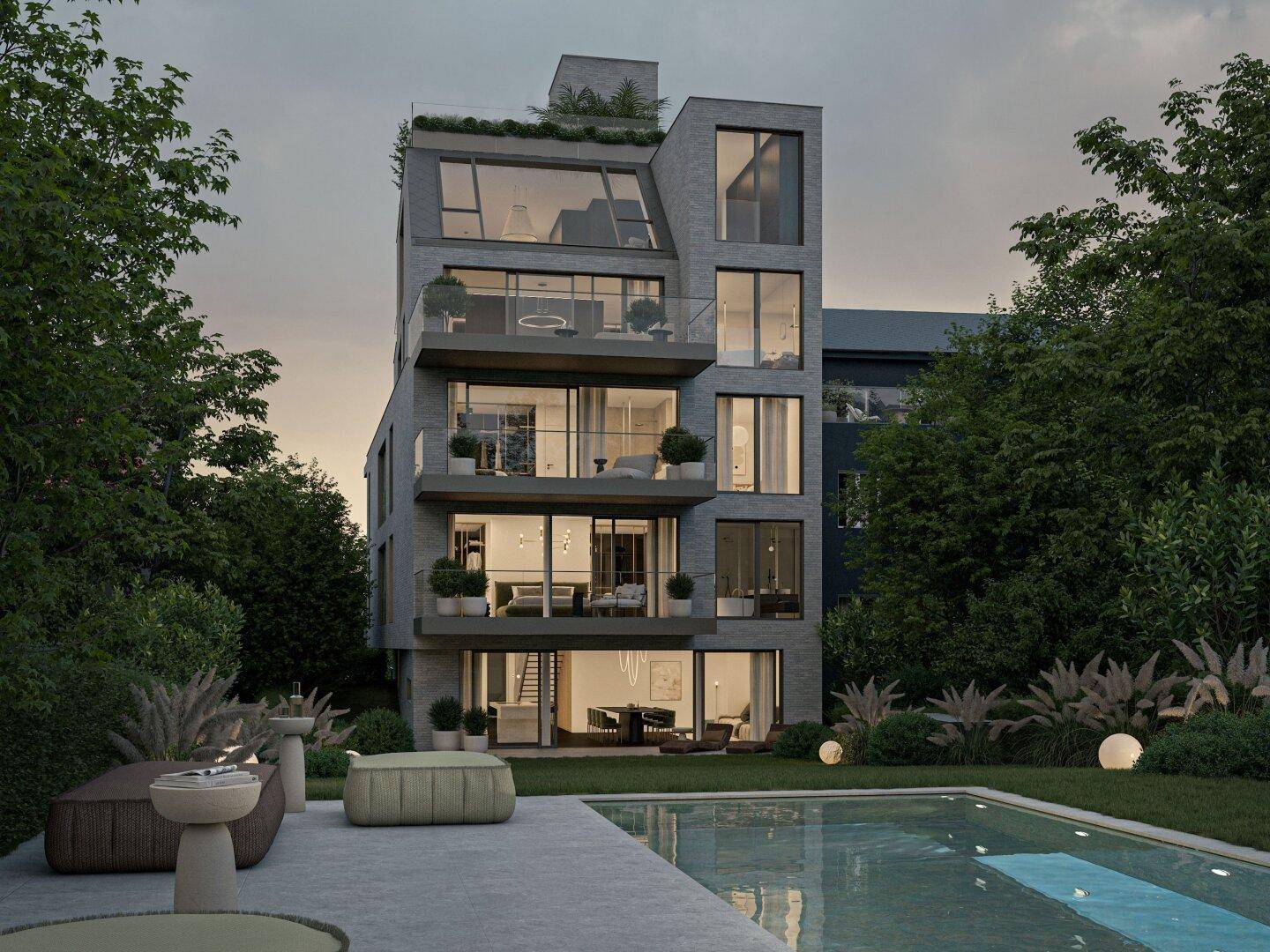 Gesamtansicht des modernen Gebäudes mit mehreren Balkonen, Pool und Garten.
