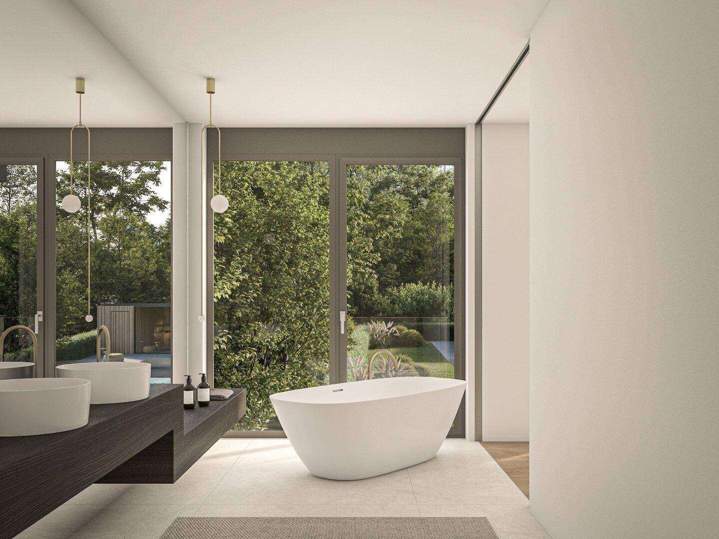 Luxuriöses Badezimmer mit freistehender Badewanne, Doppelwaschbecken und weitem Blick in den Garten.
