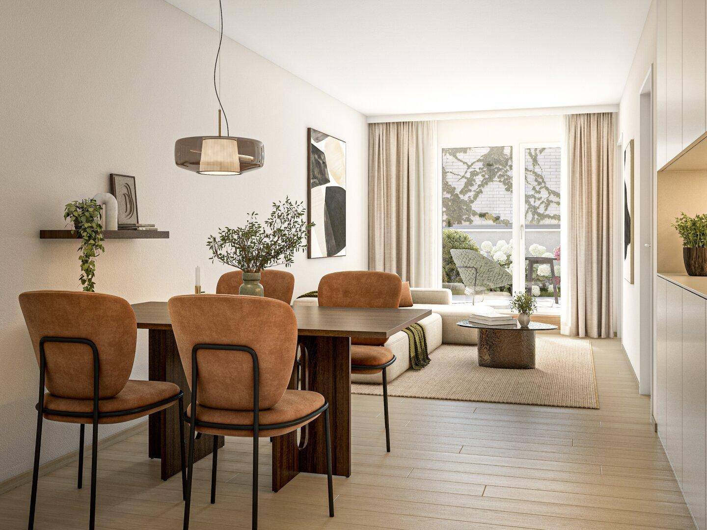 Heller Wohn- und Essbereich mit Holzboden, modernem Esstisch und Zugang zum Balkon.