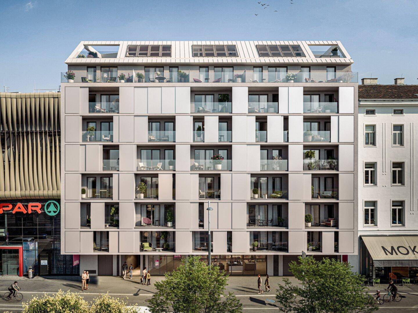 Moderne Wohnfassade eines Neubaus mit vielen Balkonen und großen Fenstern in urbaner Umgebung.