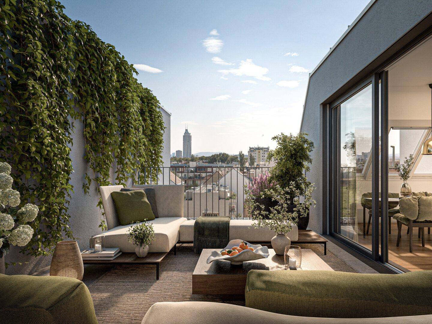 Moderne Terrasse mit üppiger Begrünung, Loungemöbeln und direktem Zugang zum Innenbereich.