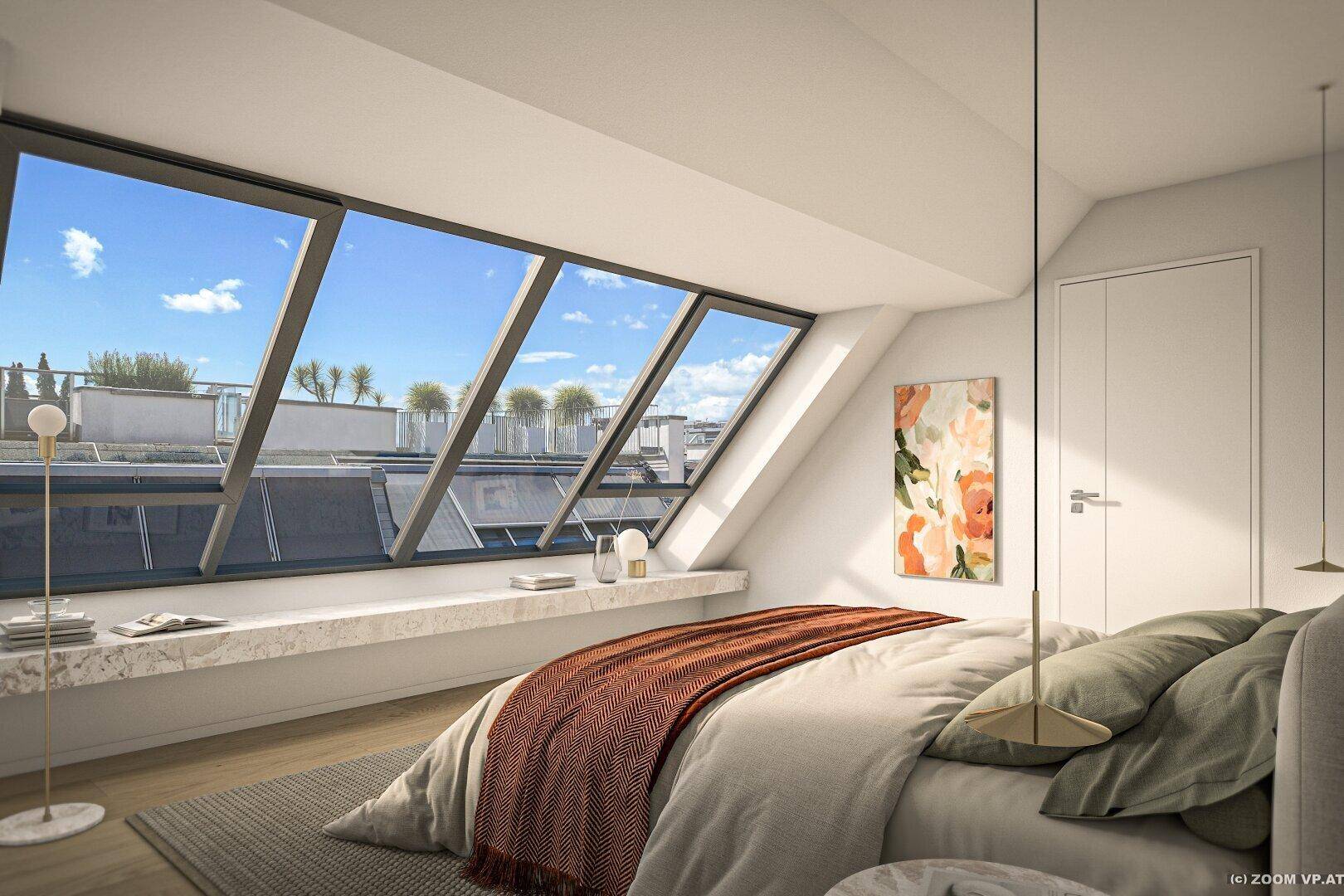 Modernes Schlafzimmer mit großen Dachfenstern und hellem Holzboden.