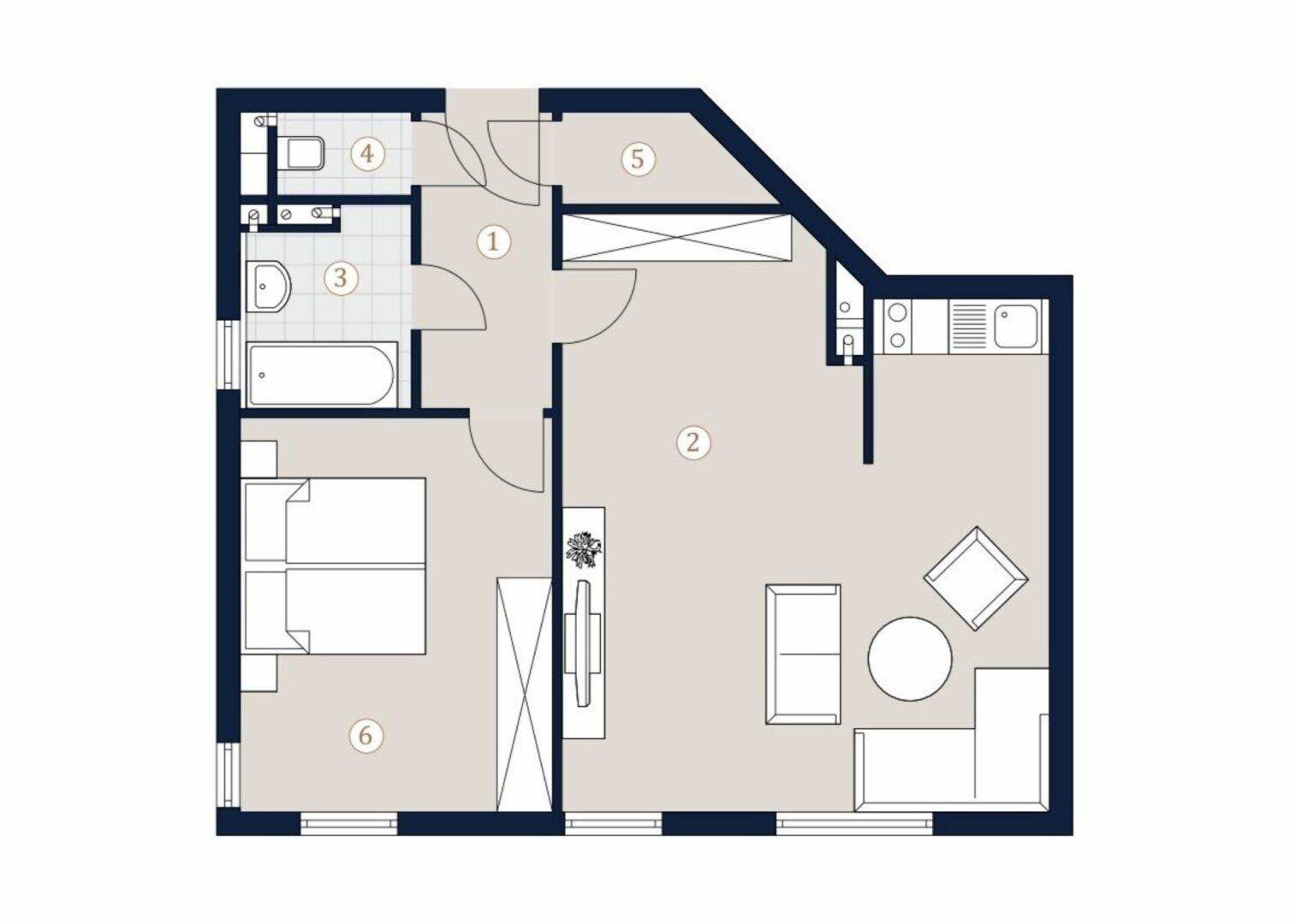 Grundriss einer Wohnung mit offenem Wohnbereich, integrierter Kochnische, Schlafzimmer, Bad und separatem WC.