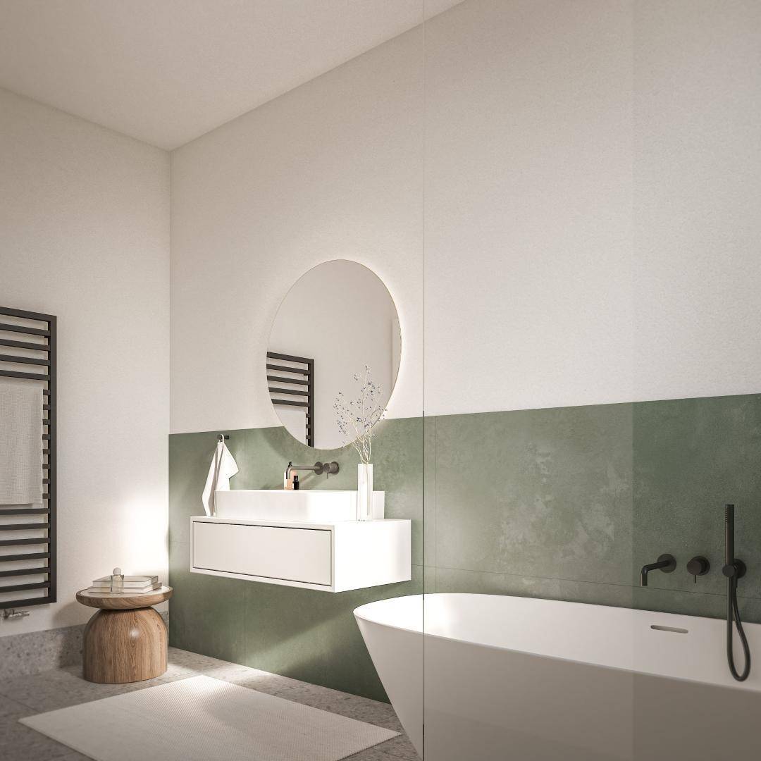 Modernes Badezimmer mit freistehender Badewanne, schwebendem Waschtisch und grün-weißen Wänden.