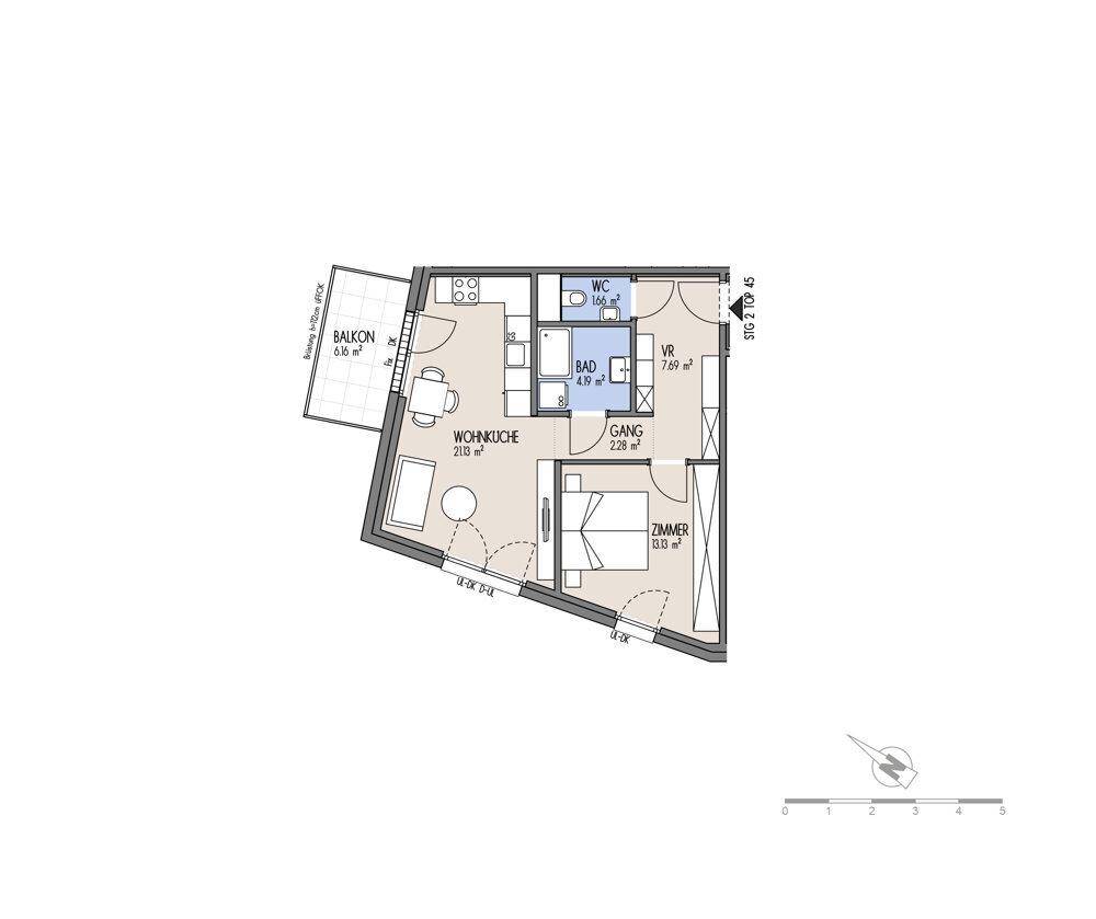 Grundriss einer Wohnung mit Balkon, Wohnküche, Bad, WC und einem Zimmer.