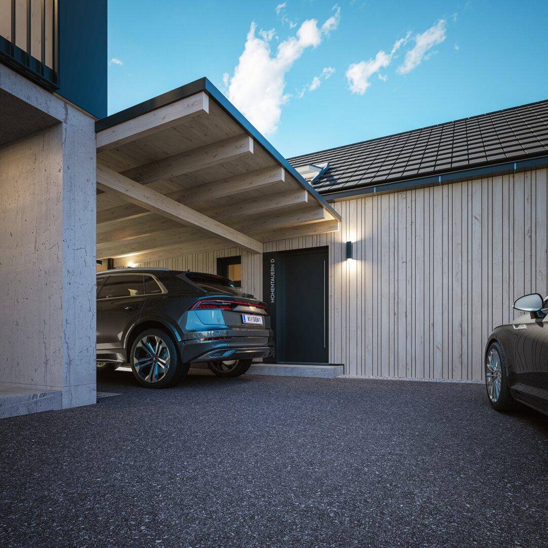 Carport mit Holzdach und Eingangsbereich eines modernen Chalets mit Holzfassade.