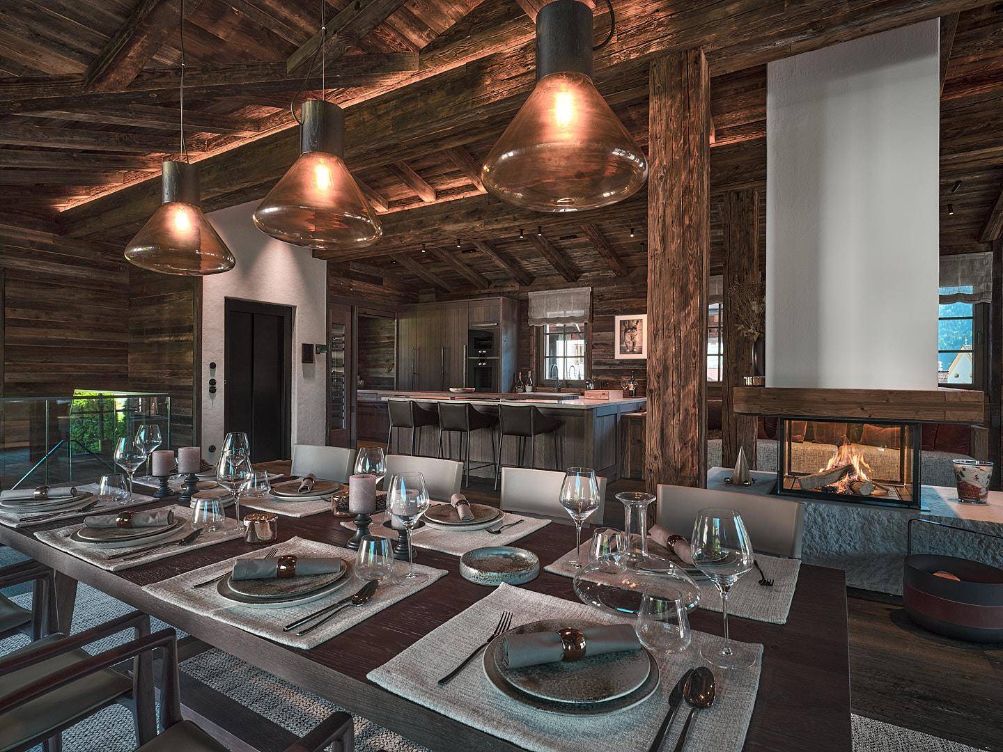 Elegantes Esszimmer mit großem Holztisch, stilvollen Pendelleuchten und einem gemütlichen Kamin im Hintergrund.