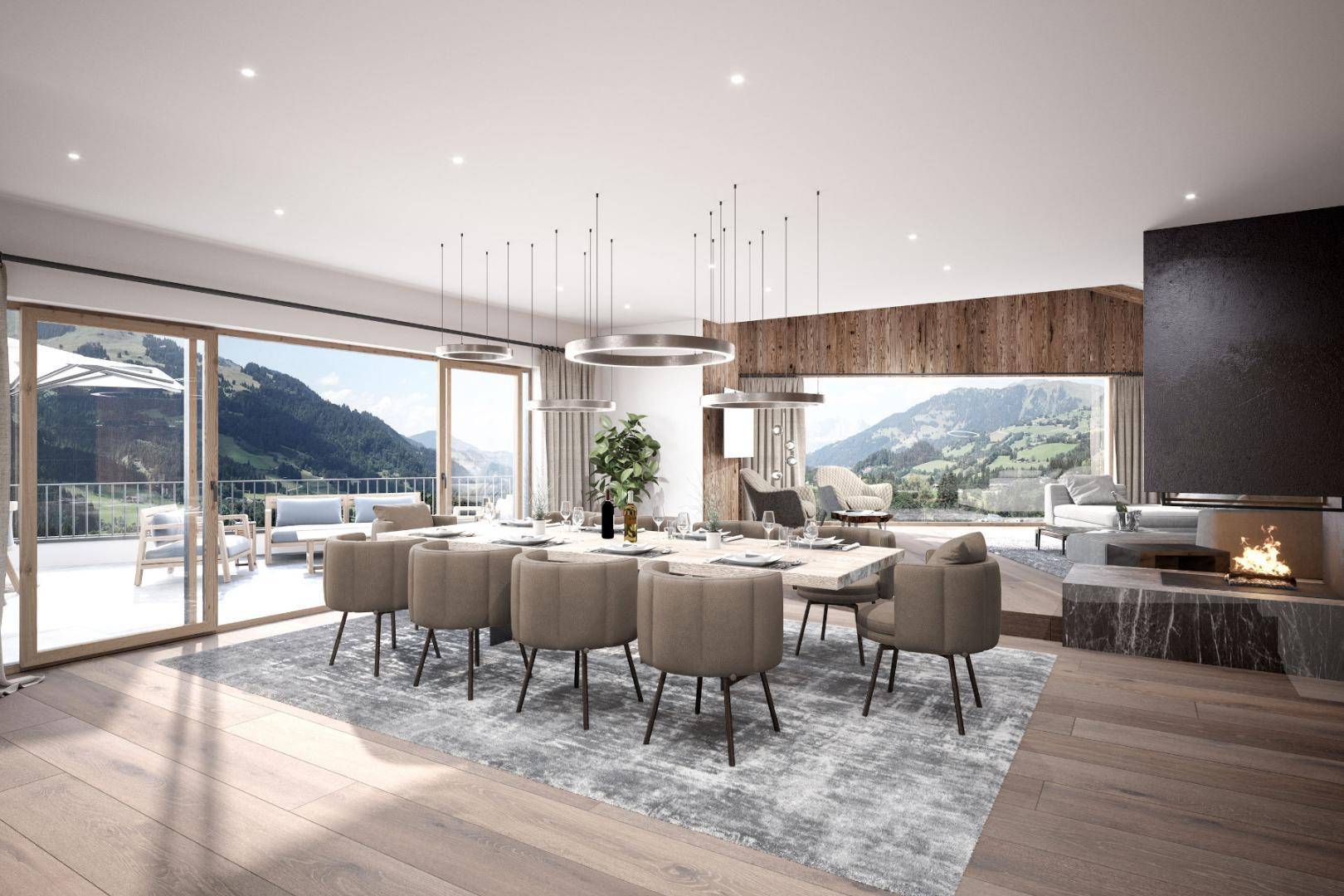 Eleganter Essbereich mit großem Tisch, modernen Leuchten und Zugang zur Terrasse mit Bergblick.