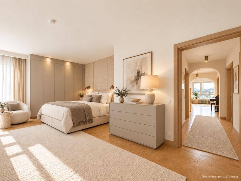 Helles Schlafzimmer mit integrierten Kleiderschränken, modernem Bett und Zugang zu einem Flur.