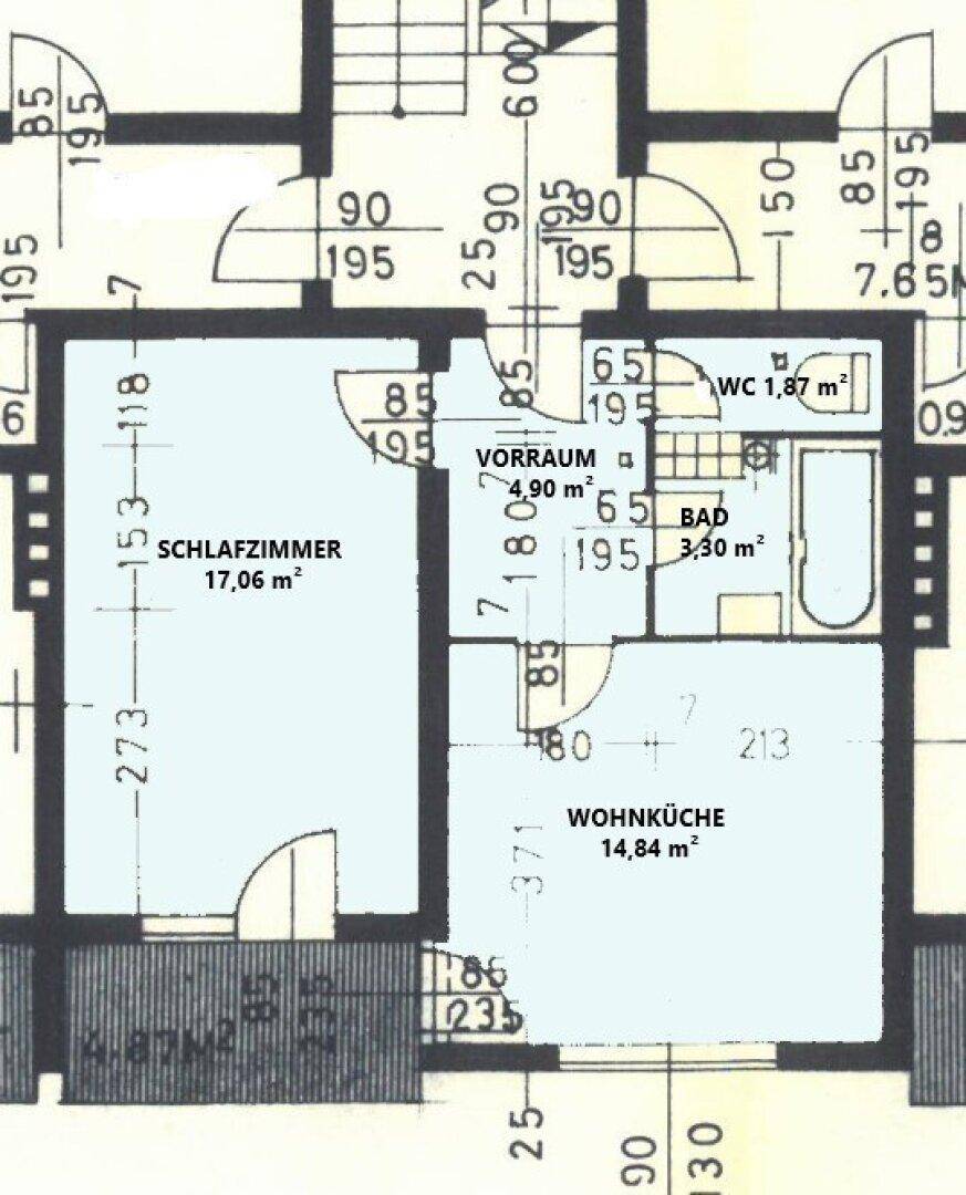 Detaillierter Grundriss einer Wohnung mit Schlafzimmer, offener Wohnküche, Badezimmer und separatem Gäste-WC.
