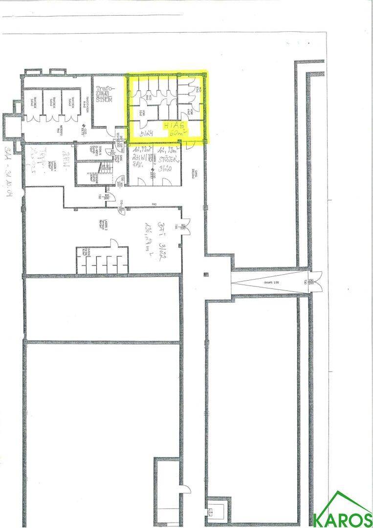 Ausschnitt eines Grundrisses, der einen Teil der Raumaufteilung mit gelb markierten Bereichen und Treppenhäusern zeigt.