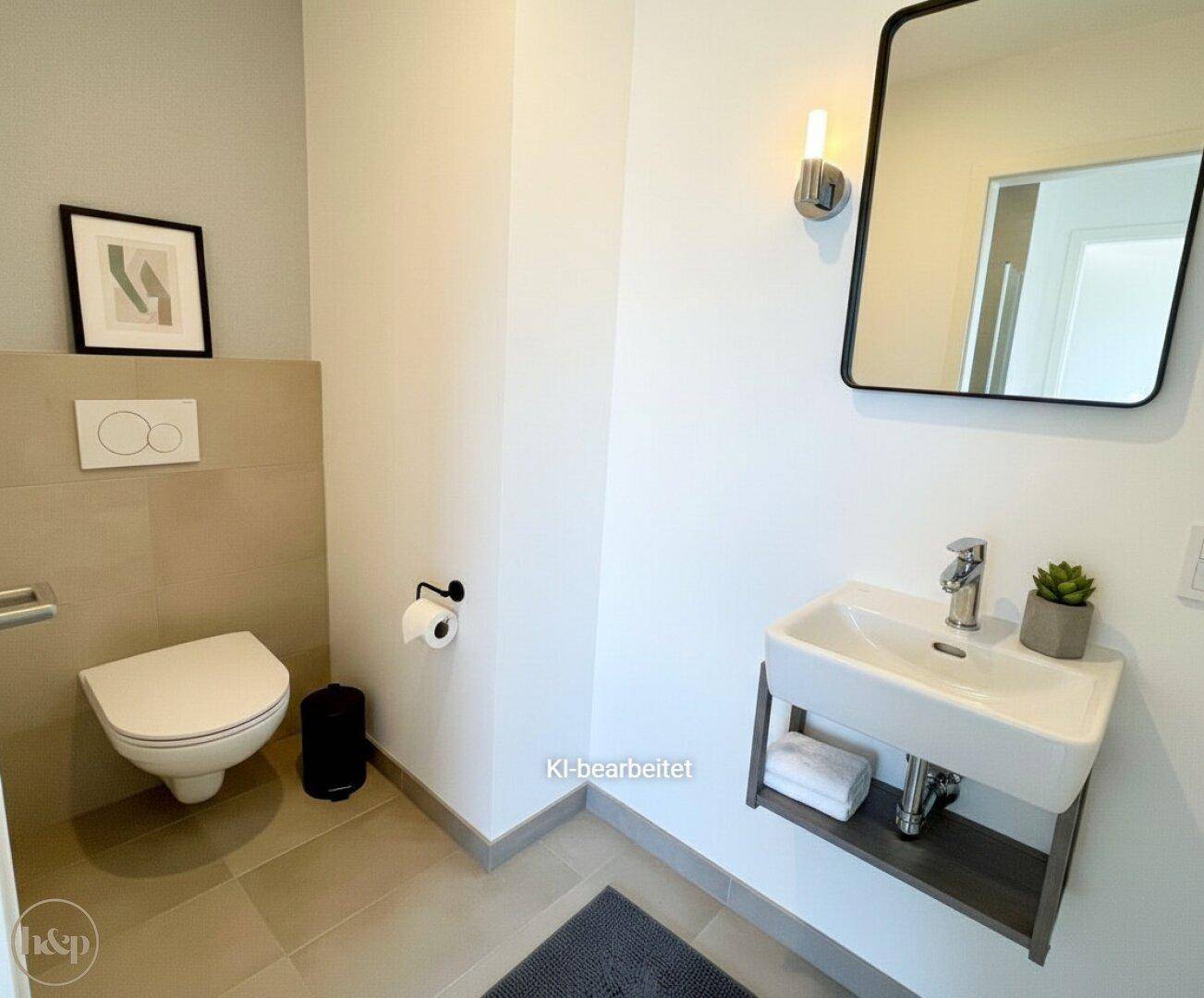 Modern eingerichtetes Gäste-WC mit Spiegel, Waschtisch und grauen Fliesen.