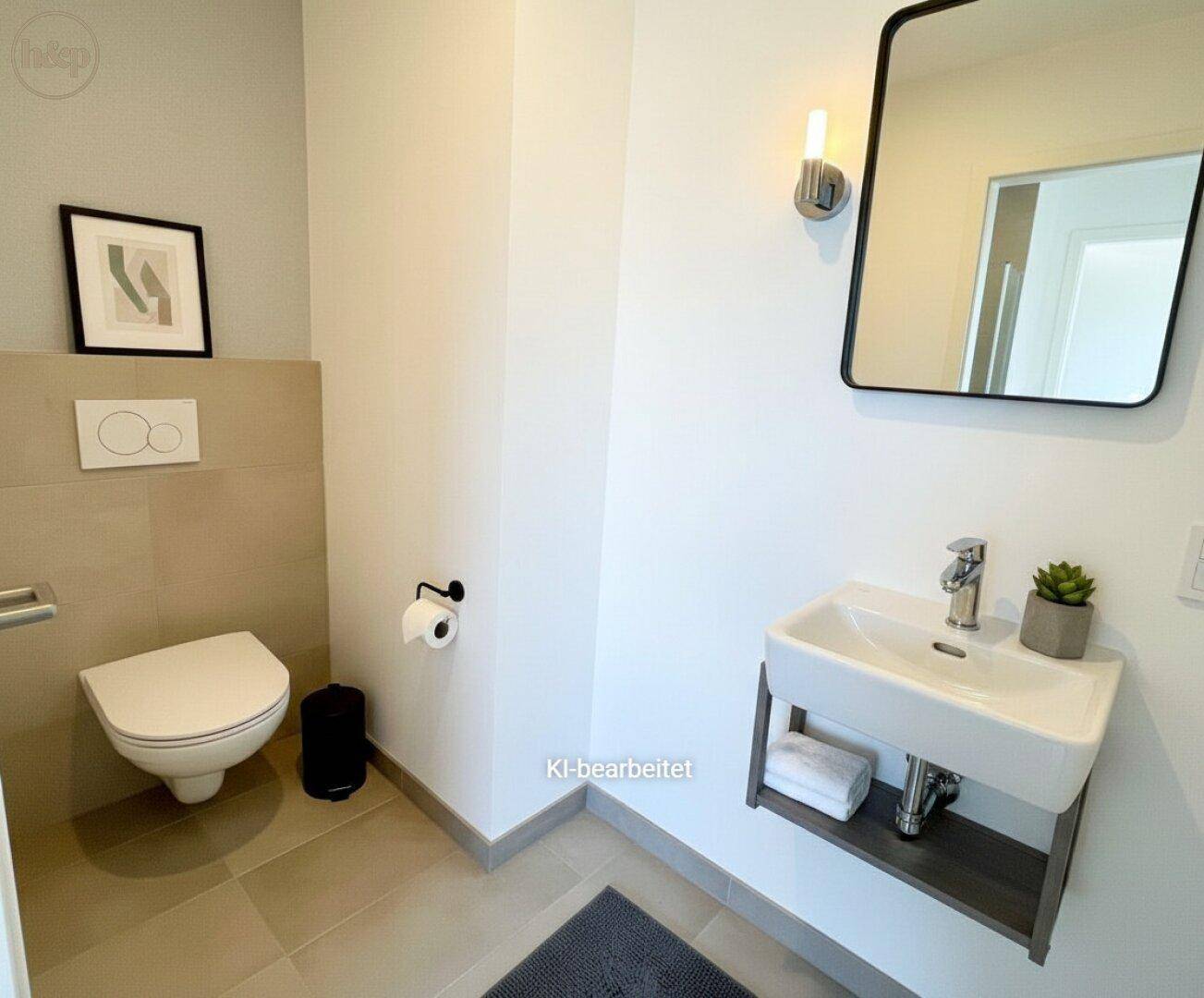 Modernes Gäste-WC mit stilvollem Spiegel, Wand-WC und kleinem Waschbecken.