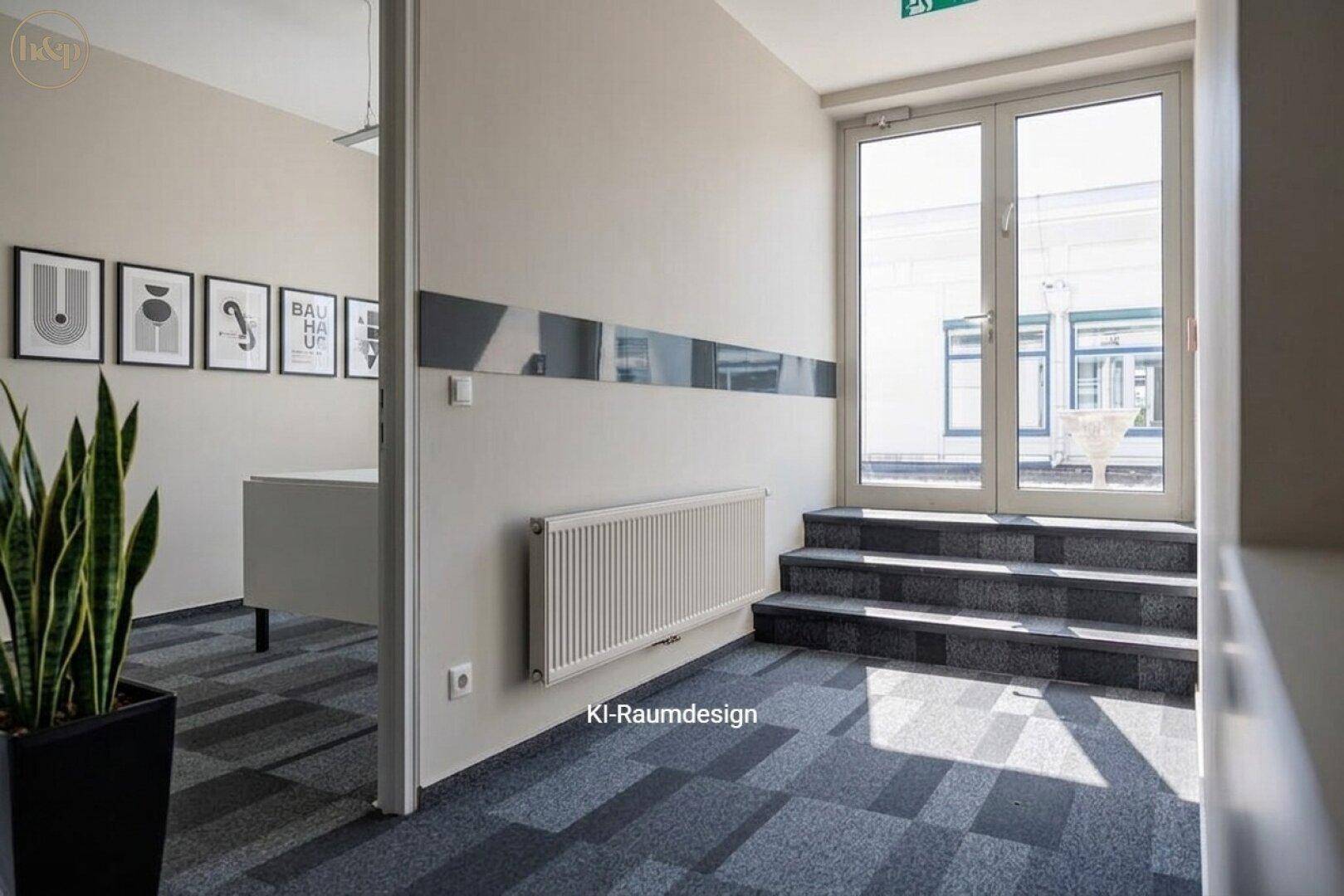 Heller Eingangsbereich mit Teppichboden, Pflanzen und gerahmten Bildern an der Wand.