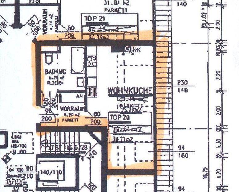 Grundriss zeigt eine Wohnküche, Bad/WC und Vorraum mit Parkettboden.