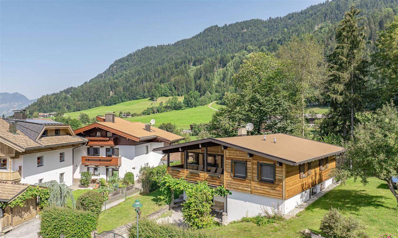 ferienhaus-itter-sommer-aussenansicht-garten-gross