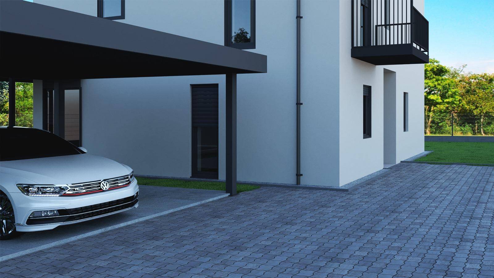 Detailansicht des Carports mit gepflasterter Einfahrt und einem geparkten Fahrzeug.