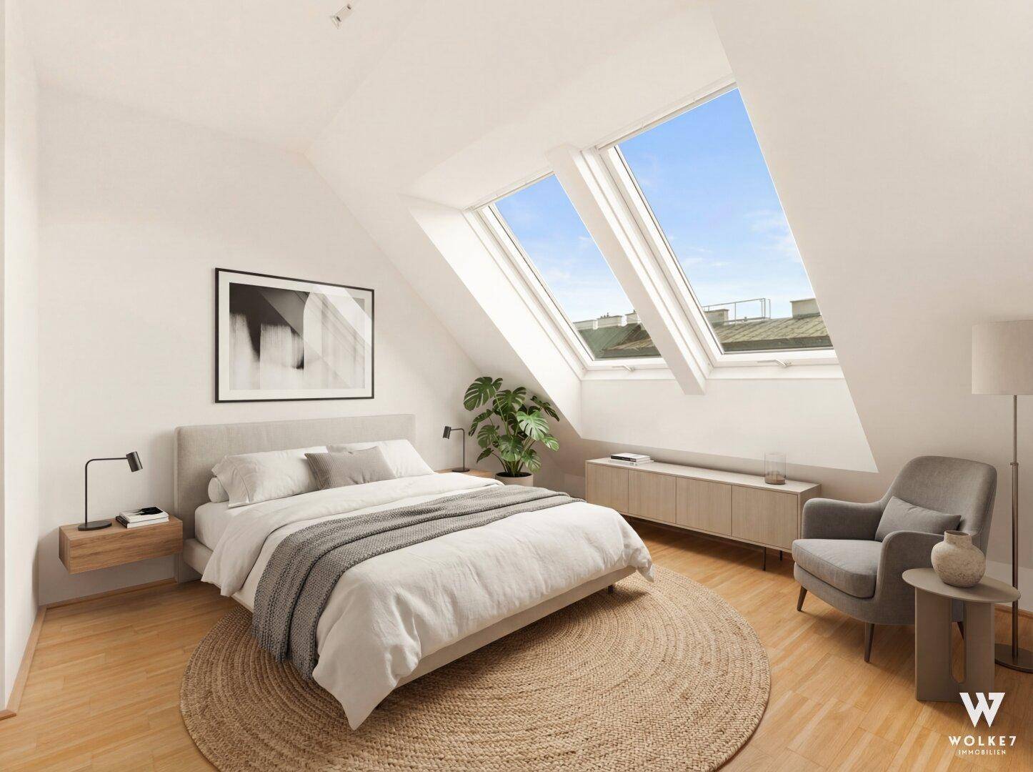 Gemütliches Schlafzimmer mit Dachschrägen, Holzboden und großen Dachfenstern für viel Tageslicht.