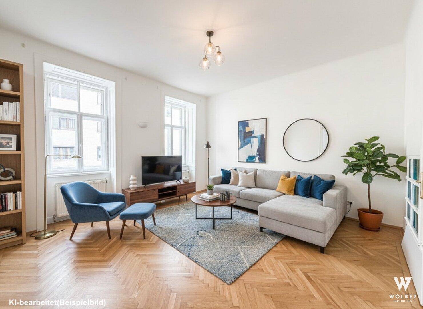 Gemütliches Wohnzimmer mit L-förmigem Sofa, Bücherregal und Fischgrätparkett.