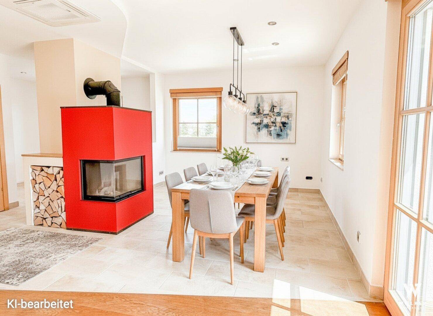 Eleganter Essbereich mit Holztisch, modernen Stühlen und einem auffälligen roten Kamin.