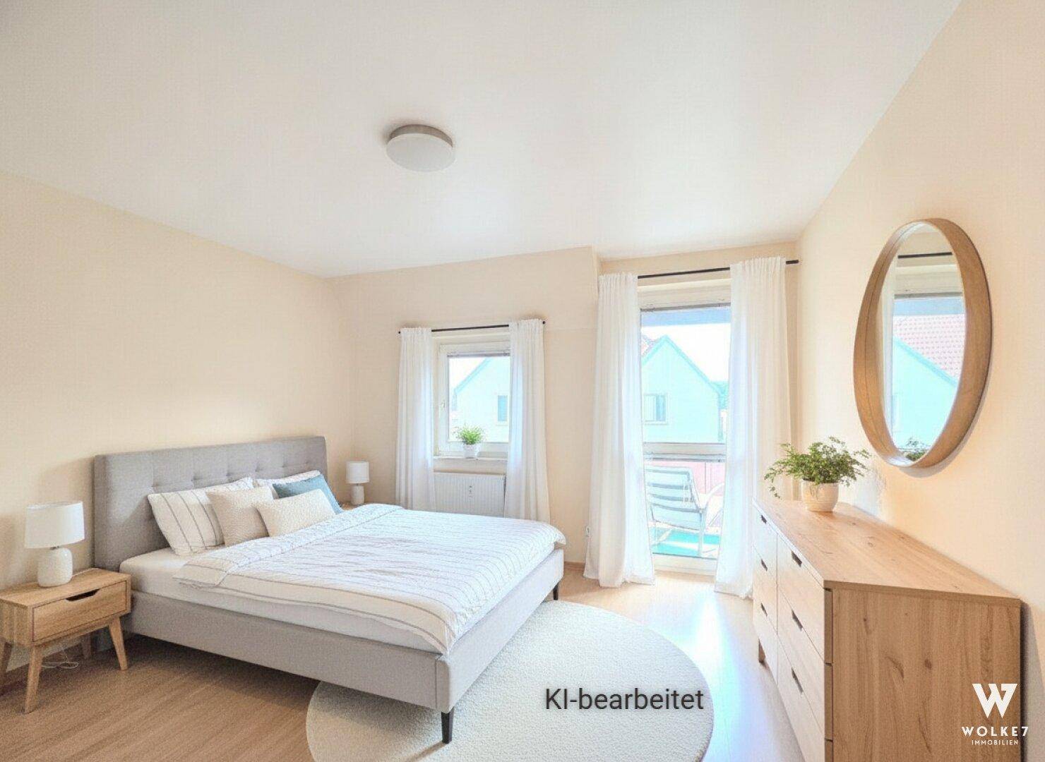 Gemütliches Schlafzimmer mit Doppelbett, Holzmöbeln und Zugang zu einem Balkon oder einer Terrasse.