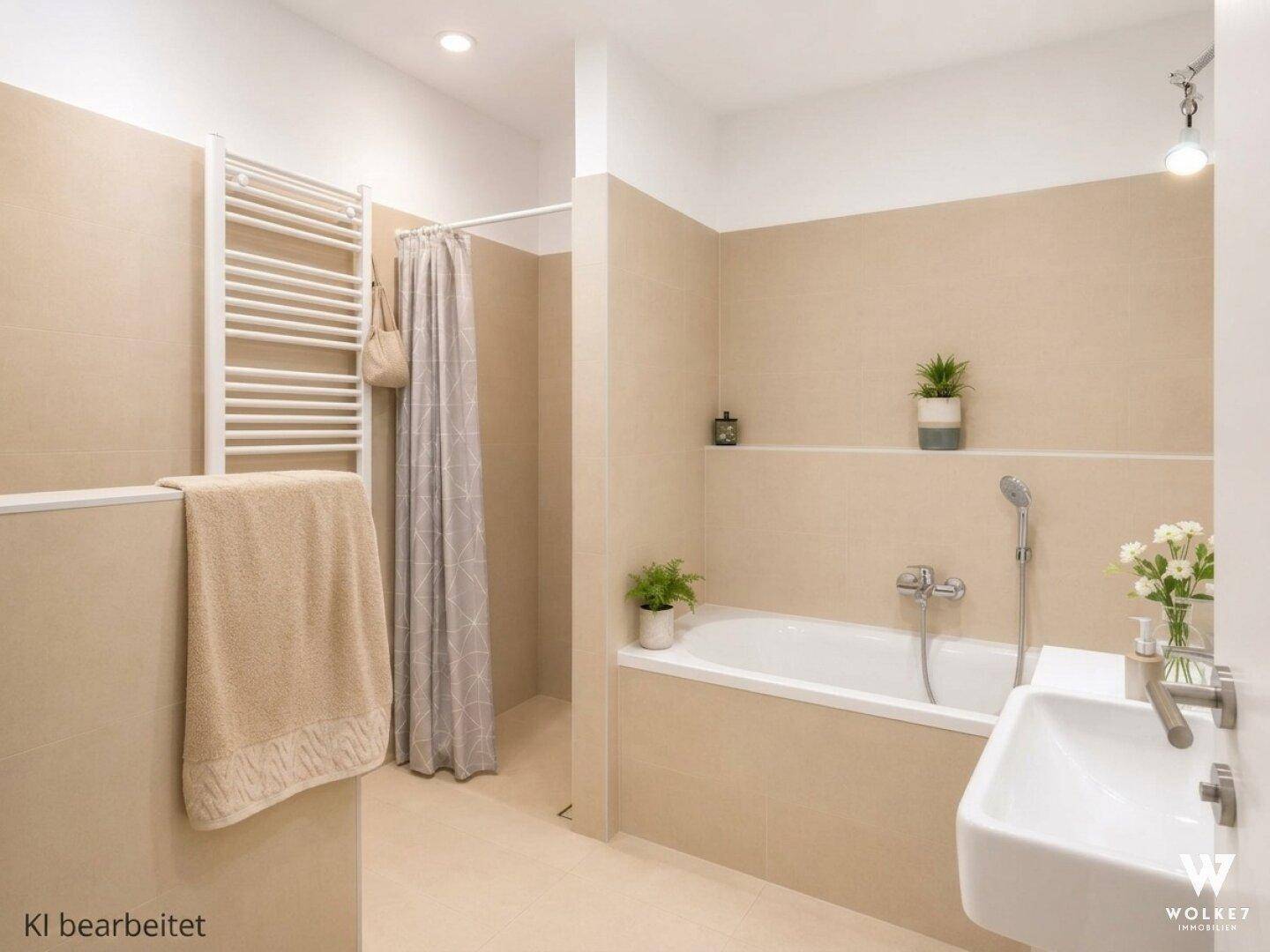 Modernes Badezimmer mit Badewanne, Duschbereich und beheiztem Handtuchhalter.