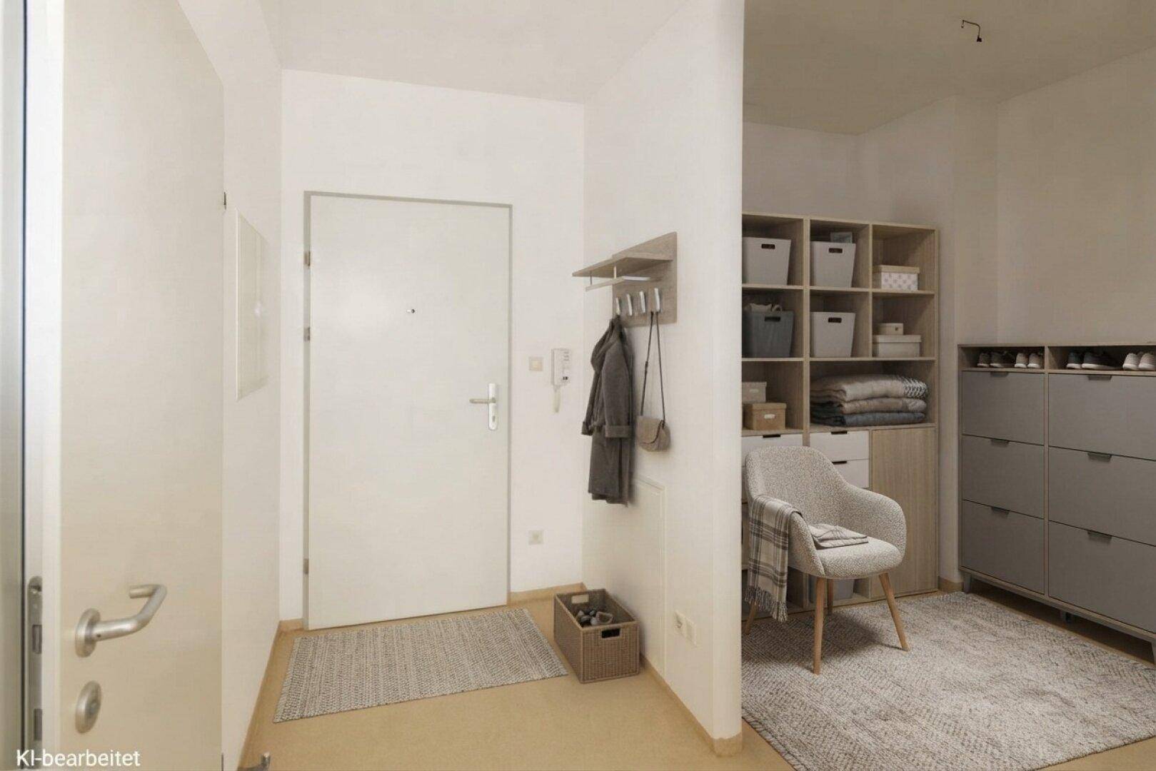 Heller Eingangsbereich mit Garderobe, Schuhschrank und praktischem Stauraum für den Alltag.