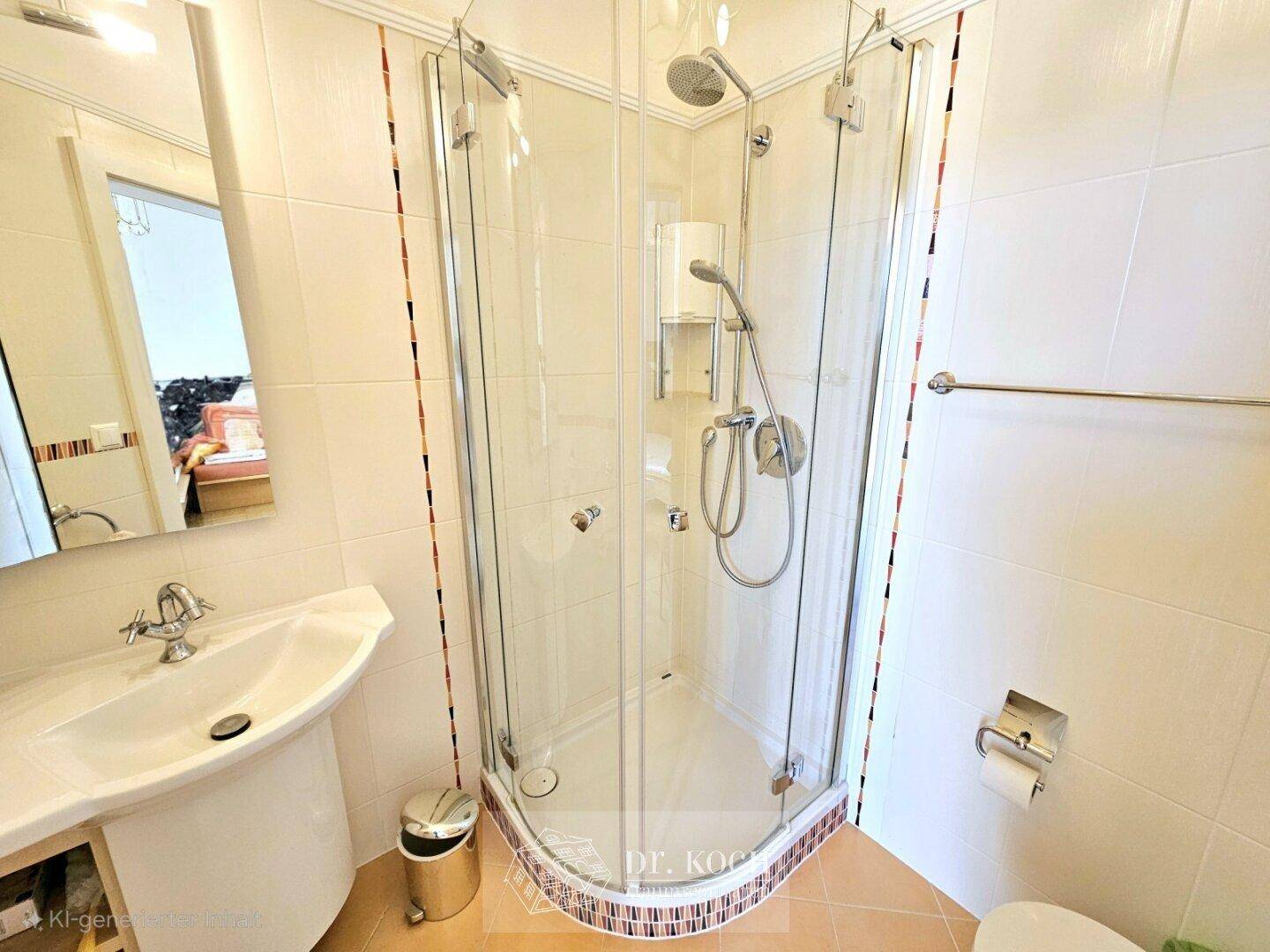 Modernes Badezimmer mit Duschkabine, Waschbecken und hellen Fliesen.