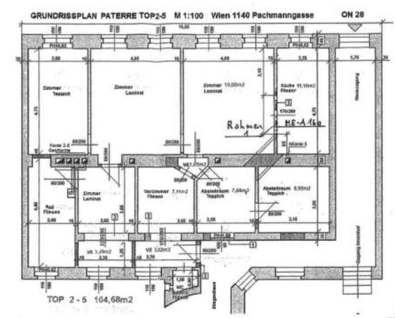 Grundrissplan einer Wohnung mit mehreren Zimmern, Küche und Bad.