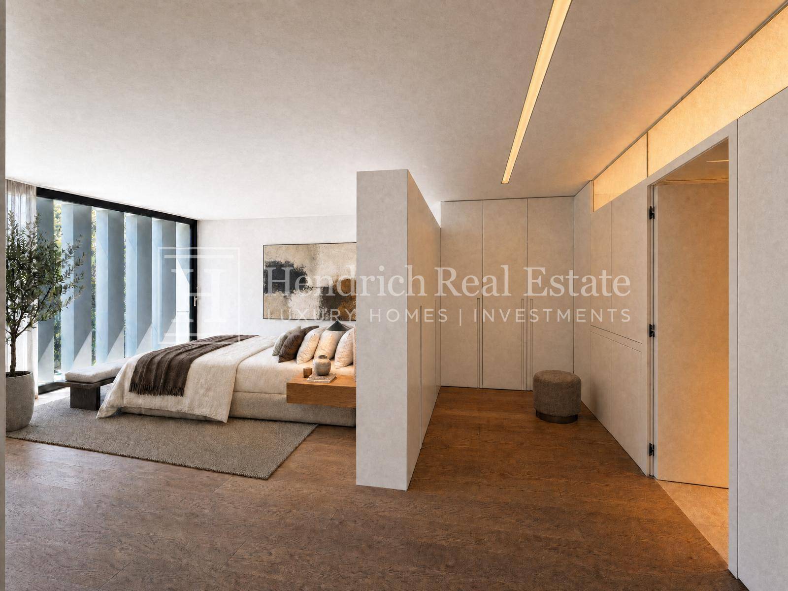 Elegantes Schlafzimmer mit integrierten Kleiderschränken und Holzboden, modern eingerichtet.