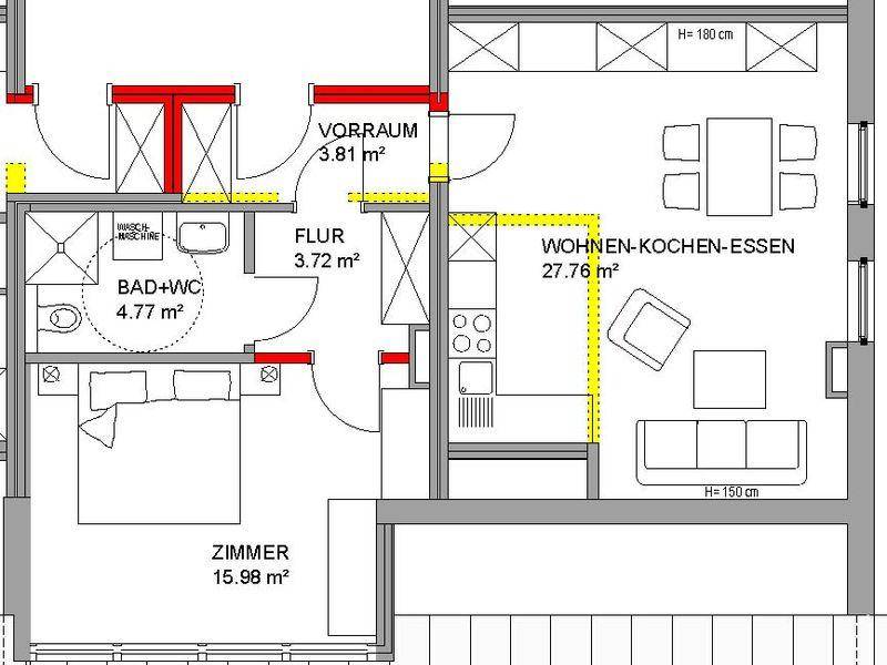 Grundriss einer Wohnung mit einem Schlafzimmer, Bad und offenem Wohn-Koch-Essbereich.