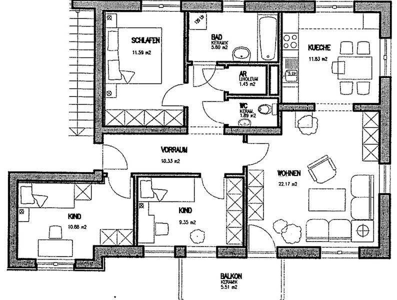 Grundriss einer Wohnung mit drei Schlafzimmern, separatem WC und Balkon.