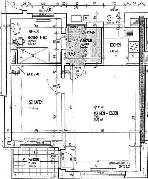 Grundriss einer Wohnung mit offenem Wohn-Essbereich, Schlafzimmer, Bad und Balkon.