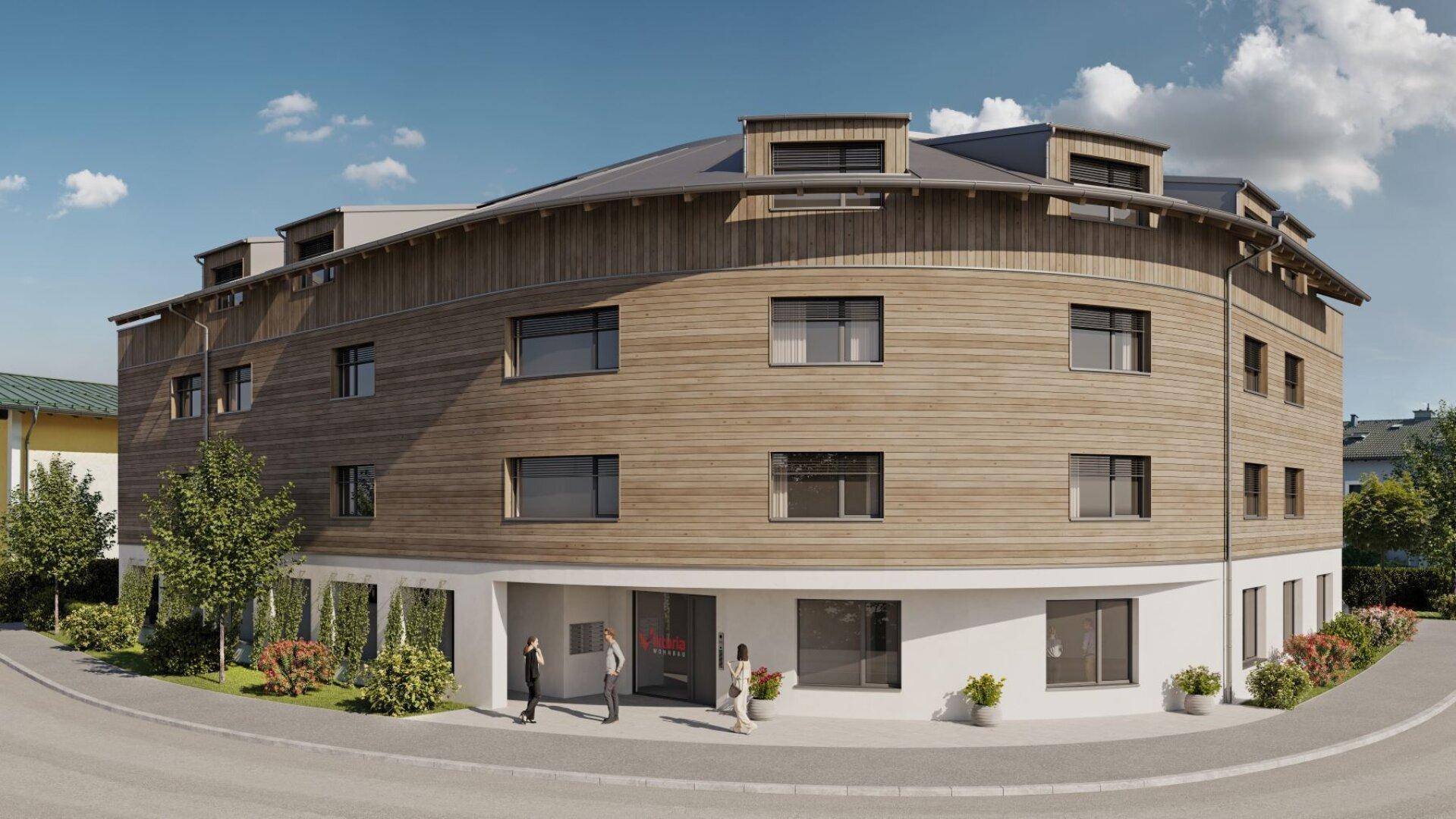 Modernes Gebäude mit geschwungener Holzfassade, weißen Akzenten und Dachgauben in einer städtischen Umgebung.