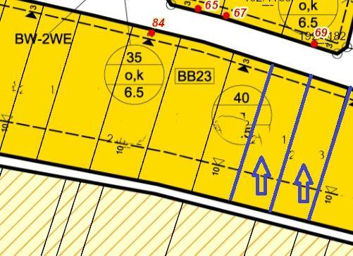 Detailansicht eines Katasterplans mit Grundstücksgrenzen und Parzellennummern in gelber Markierung.